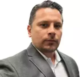 Eric L. Schacher headshot